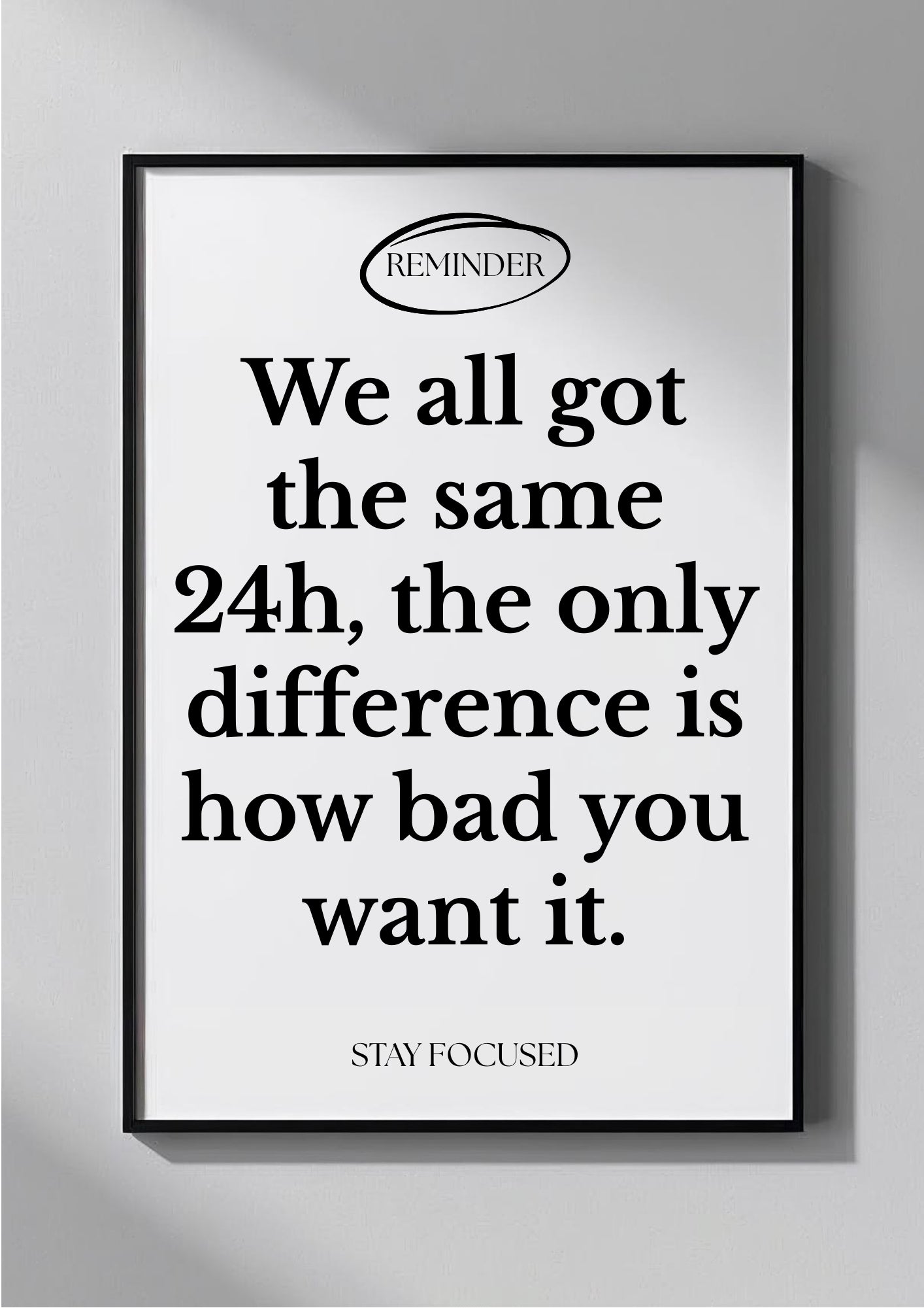 Framed motivational poster with text on a gray wall